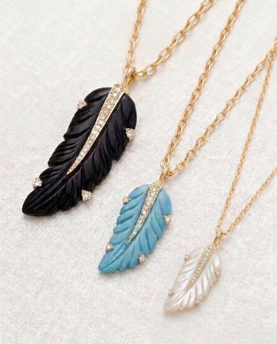 The Feather in three sizes in onyx, turquoise and mother of pearl